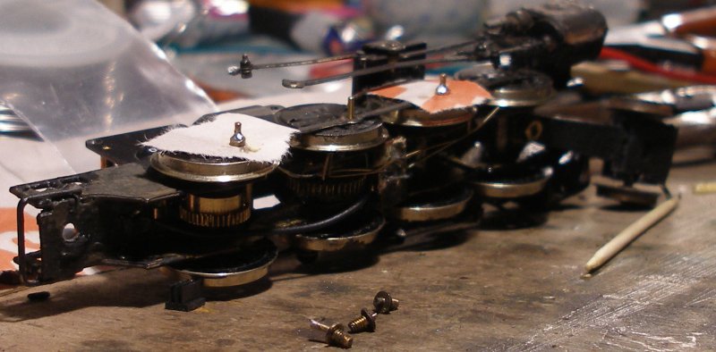 Fitting Romford crank pins -5: Now the soldering iron and solder is applied to the top of the crank pin bush.