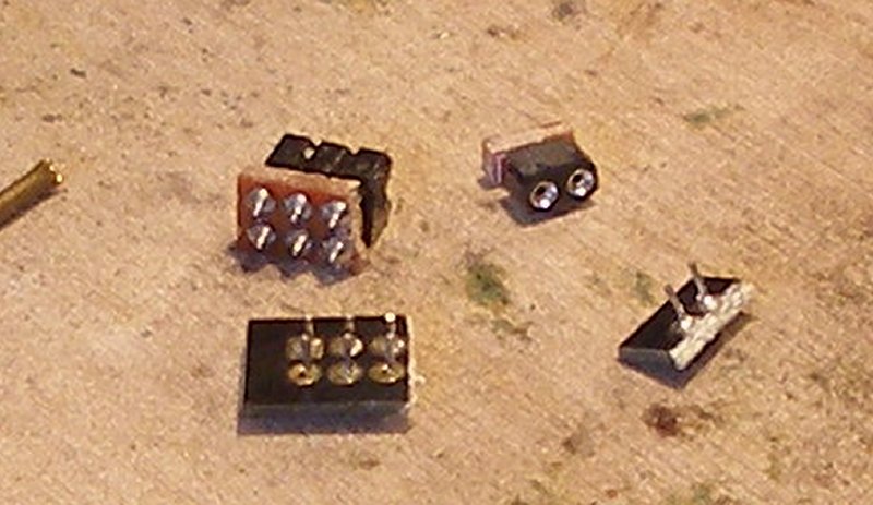 Fitting extra pick-ups to a DJH WD 2-8-0 tender: A pair of sockets is cut from a DCC socket, and the plug formed from two pins on a spare blanking plate.