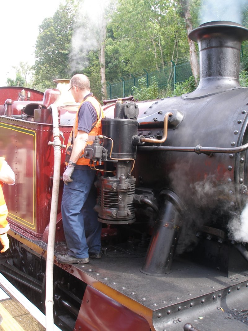 L.150 is watered at Chesham station on Sunday 13 September 2015.