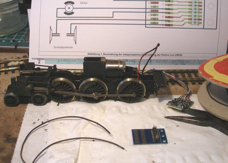 The DJH Caprotti Standard 5 Portsecap-fitted chassis with pick-up wires pulled through ready to be cut.