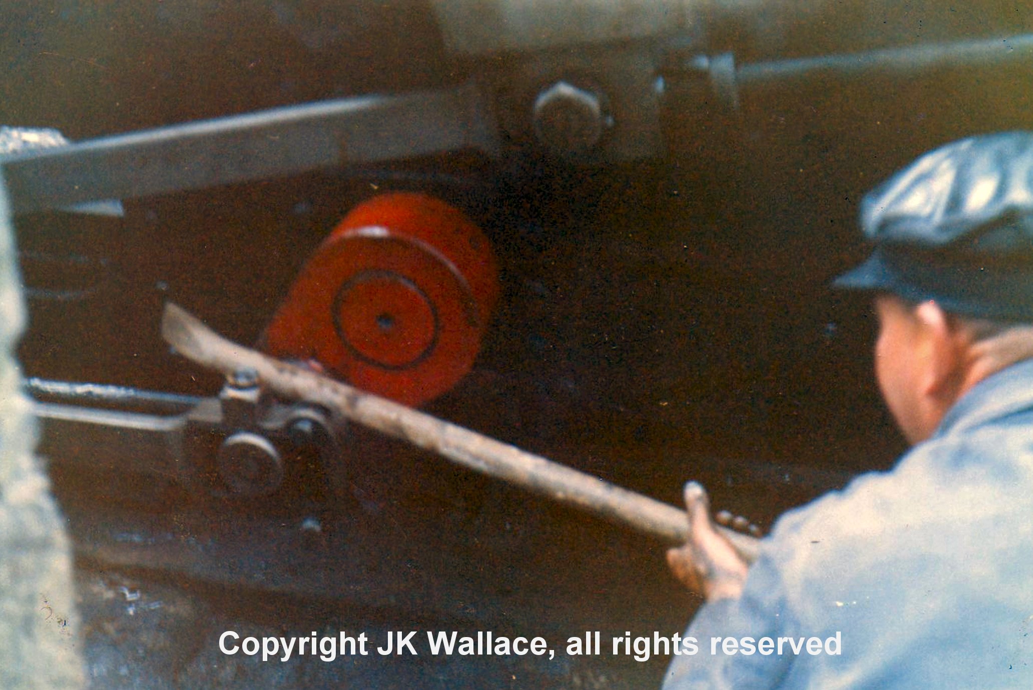 Driver and General Manager Alan Garraway sets about removing Linda's coupling rod at Tan-y-Bwlch. Sunday 31 July 1966 having already removed the brasses.
