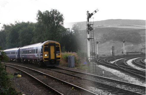 Composite photo showing Stansfield Hall Junction in 1966 and in 2013.