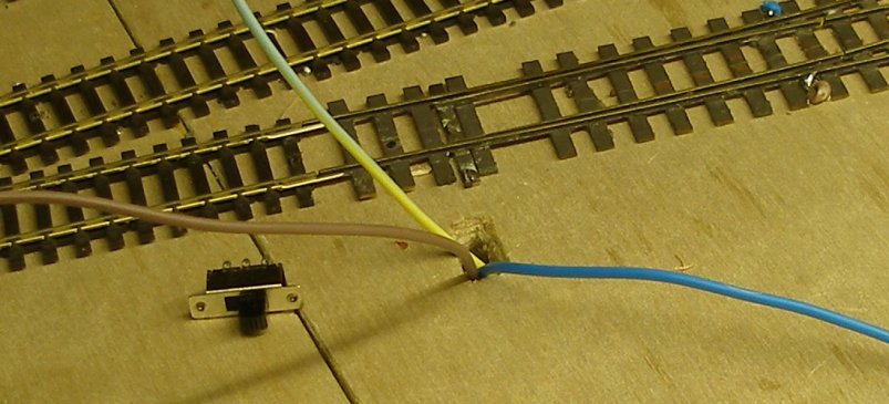 Fitting a DPDT switch for changing copper-paxolin points.