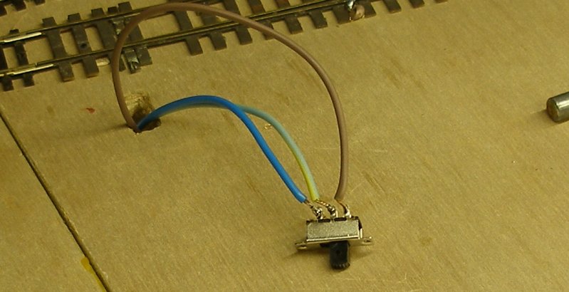 Fitting a DPDT switch for changing copper-paxolin points.