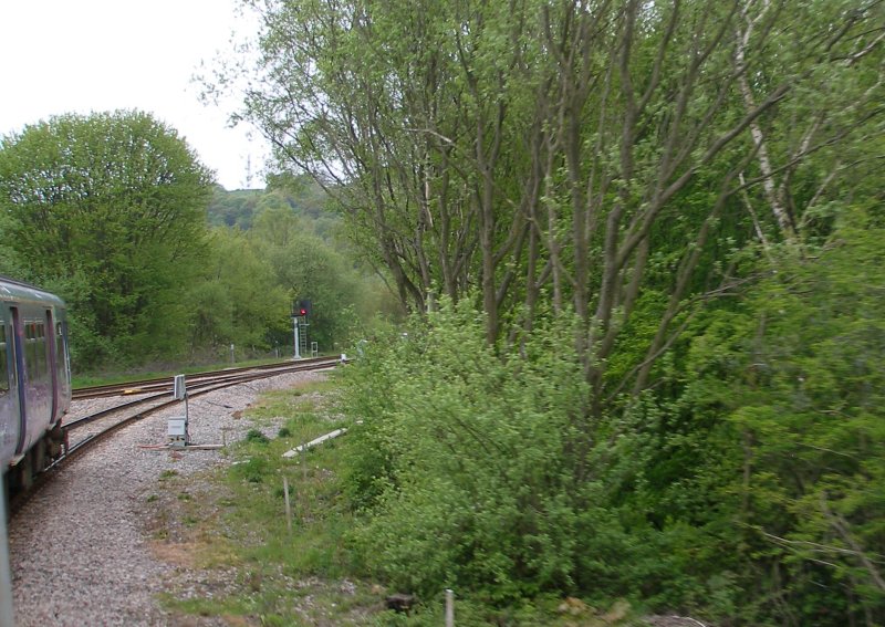 First train enters the Todmodern curve from Stansfield Hall Junction