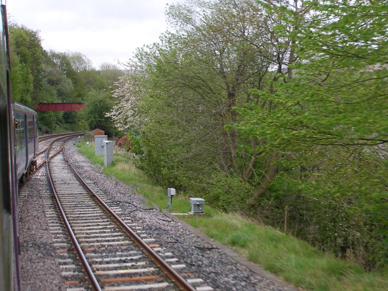 First train approaches the Todmodern curve from Copy Pit